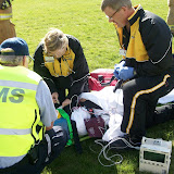 Crews from Aircare and other emergency officials strap in the mock vicitm