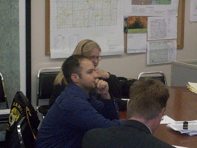 Teamsters Local 238 Business Representative Kimbra Wilson (Back) and Steward Eric Webber present Washington County Supervisors with a contract proposal on behalf of the Sheriff's Deputies 10/29/09 (KCII NEWS)