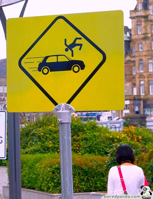 Funny sign with illustration of car hitting the person