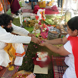 People taking the blessing from Maitreya