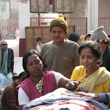 Ammananda distributing blanket