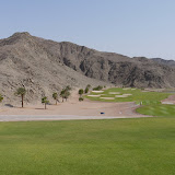 Lush fairways and blast furnace desert side by side