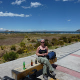 Sitting in front of the highly disappointing lake front in Puno