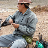 Willy prepares some dynamite to explode outside the mine