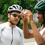 Marc shows Arie how to use the camera.
