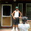 Carey photographs Arie on his front porch.