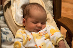 On Audrey's one month birthday, we had quite a few visitors from Milbank. My folks, my sister and nephew had the time to come up to Grantsburg to see Audrey and we had a great weekend. This was the same weekend that Vanessa was home as well. Full house, but very fun. Here, she is snuggled up to Grandma Georgianne.