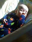 Hand in mouth. Not so strange to see really.