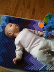 Audrey hanging out with her elephant toy.