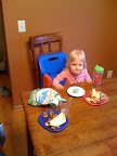 Picture of Brooke eating a mini-muffin when we visited the cousins and Grandma Boerger one weekend. I don't think you can tell in this picture, but Brooke has a little blue sugar mustache.