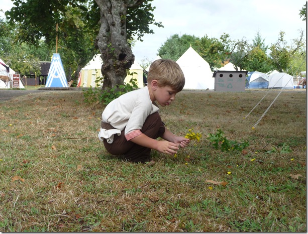 Reese picking flowers