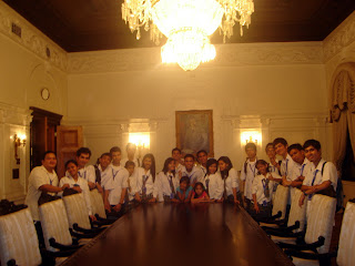 March 12: Students circle around the former Presidential Staff Table in Malacanang Palace.