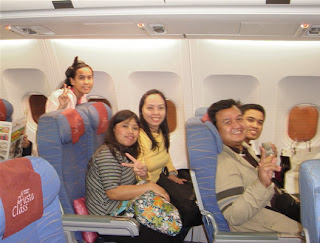 Day 6 (7:00 pm) - (From Left:) Licca Andrada, Ms. Lilet Onggon, Ma'am Revie Garcia of CAP College SFD, Sir Ervin and Sir Jerome aboard the Philippine Airlines Flight 469 enroute to NAIA 2