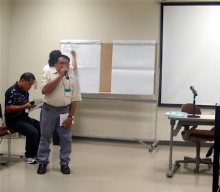 Day 2 - Mr. Reginaldo Tolentino of NCDA presents a summary of day one's activities.