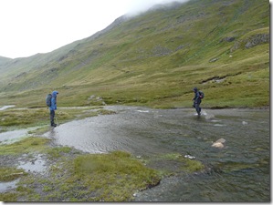 Steve crossing Grisedale Beck with Carol watching (anxiously)