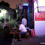 A man making lamb sticks