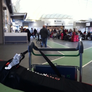 a luggage cart in an airport