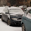 Snow-covered cars