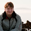 Thomas at the foggy, rocky beach