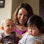 Ali holds the babies