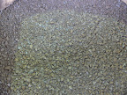 The black sheets crushed into particles of 3 mm diameter.