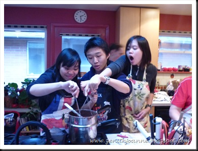 OMG. My idiotic look! WE were trying to dip bananas and strawberries into the pot of hot yummie chocolate.XD