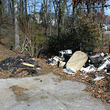 Possible environmental concerns noted during a Phase I EA - Shingles may contain asbestos