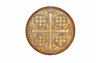 An inlaid Cross in Marble taken from a side alter in St Mary's