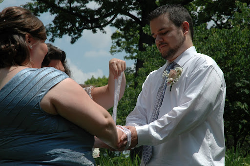 Jodi and Corey with the hand fasting ceremony