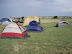 A storm begins to blow...notice the wind on the tents