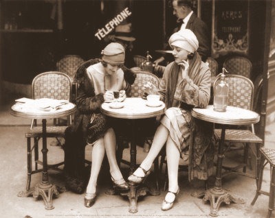 [women-sitting-at-a-cafe-terrace[5].jpg]