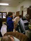 Several visitors to St. Andrew's including Ellie LeMoine(in blue), the widow of former vicar Roland Sherwood, join the congregation for lunch on St. Andrew's Day
