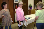 Somer Brown, Barbara Fox, and Shirley Shelton waiting for buffet.