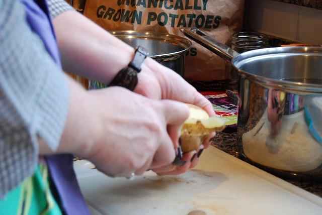 Peeling potatoes