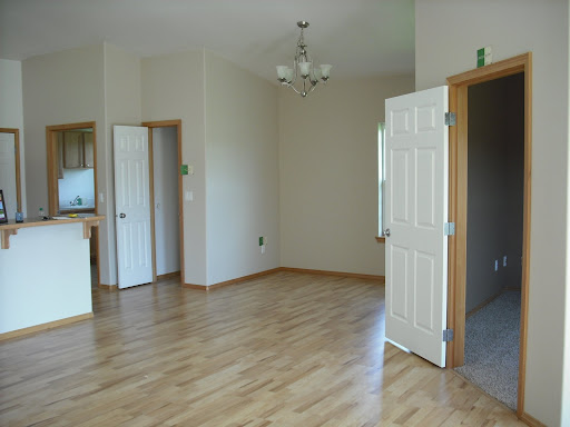 From left to right: Breakfast Bar, Mud Room, Pantry, Dining Room, and Media Room as seen from by the back sliding door