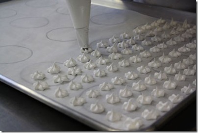 Airy meringue stars on their way into a batch of Violets & Meringue Ice Cream