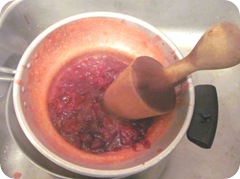 Jellied cranberry sauce in sieve2 Jellied cranberry sauce in sieve2