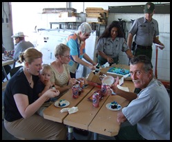 ed_larry and family eating cake at his retirement_092702