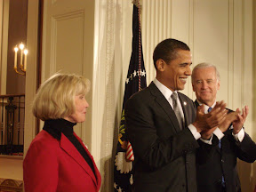 President Obama and Vice President Joe Biden lead applause for Lilly Ledbetter at the signing of the Fair Pay Act in January.