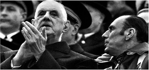 President Charles de Gaulle applauds the delegations at the opening ceremony. On the right, Dr Albert Michallon, the COJO president