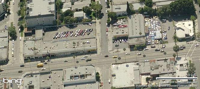 7614 West Sunset Boulevard is the lot filled with cars in the right of this photo