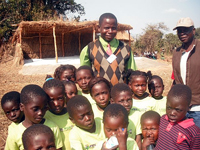 head teacher Frank and the children in uniform