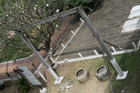 Originally the pupil's exercise beams, this became an instrument of torture where the victims were raised by their arms (tied behind ther backs) until they lost consciousness, before being then dunked in the filthy water jars below. Repeatedly.