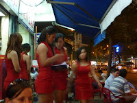 The ever present beer girls coming to tout their wares en masse...