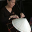 The famous conical hats are incredibly cheap everwhere, but require time and intricate effort to weave between each rice stalk.