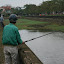 Locals fishing in the Citadel's moat.