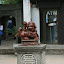 Alongside from strange statues of dogs, you can also find a convenient ATM.