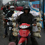 You can carry anything on a scooter, even a replacement chicken farm.