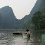 This lady was fishing, and then penning in her daily catch for later munchies...