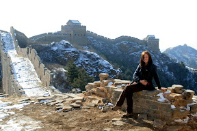 Lynette enjoying a breather on the Great Wall of China.